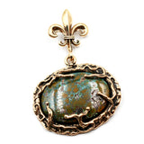 Unusual Turquoise stone set in Bronze Pendant. Trq002