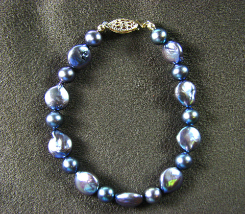 Purple peacock coin pearl bracelet.