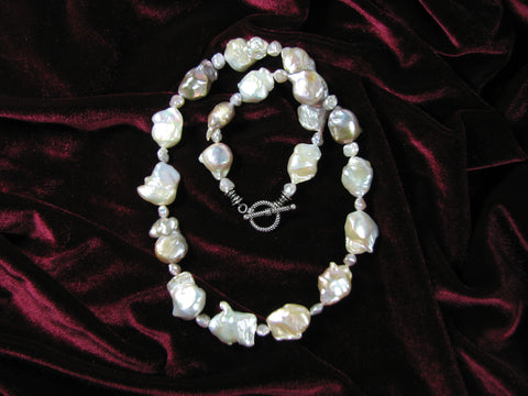 large fresh water pearl strand w/ sterling toggle clasp.