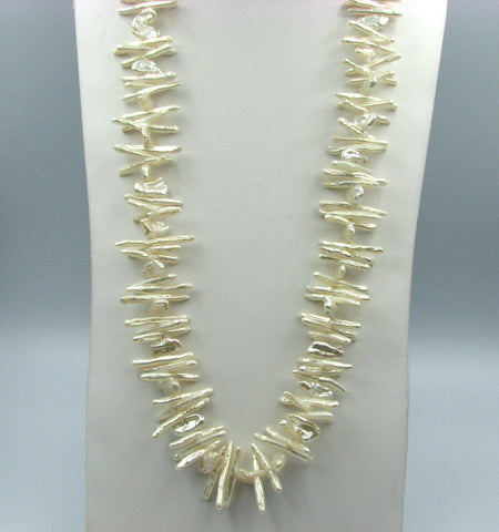 Pearl Necklace w/ sterling silver clasp.